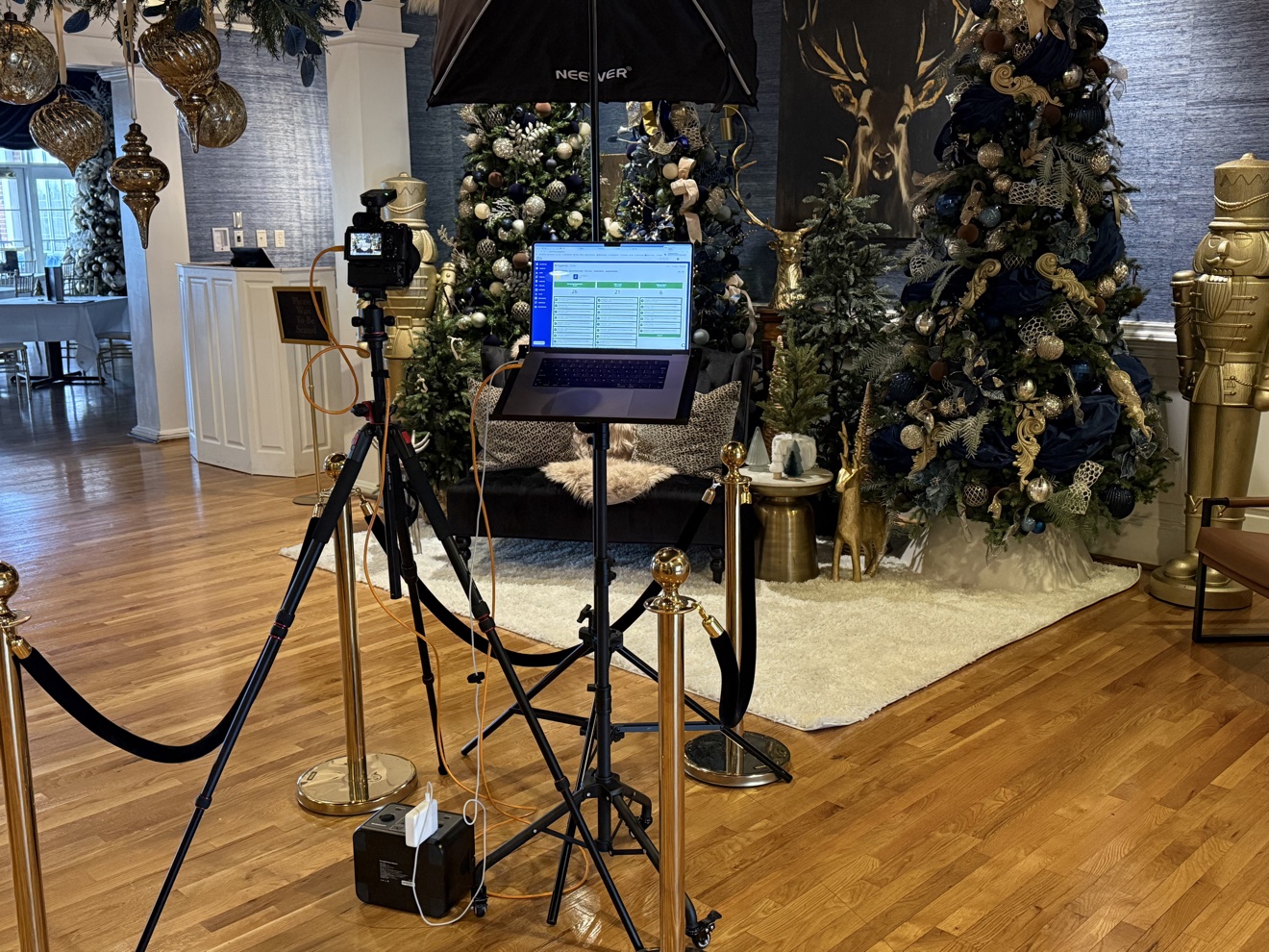 Mother and child smiling with Santa at a PVME Christmas portrait session