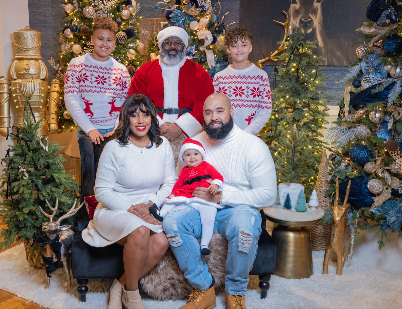 Family of three with Santa at PVME Christmas portraits, Richmond VA